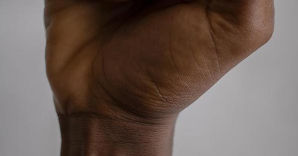 close up of black hand in a fist