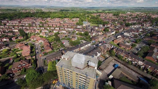 A sky view of a tower block seen from above 