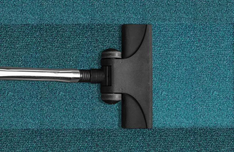 Vacuum Cleaner on a carpet floor