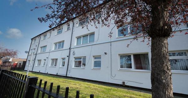 White houses made into flats from the front