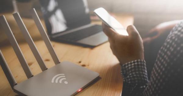 Person At A Desk On A Mobile