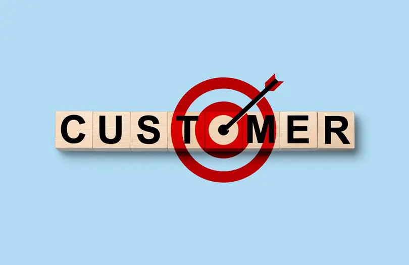 Customer  in wooden blocks and arrow 