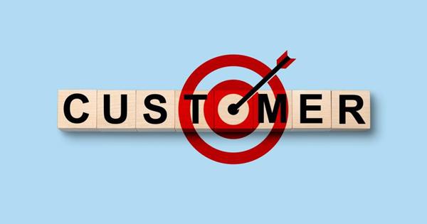 Customer  in wooden blocks and arrow 