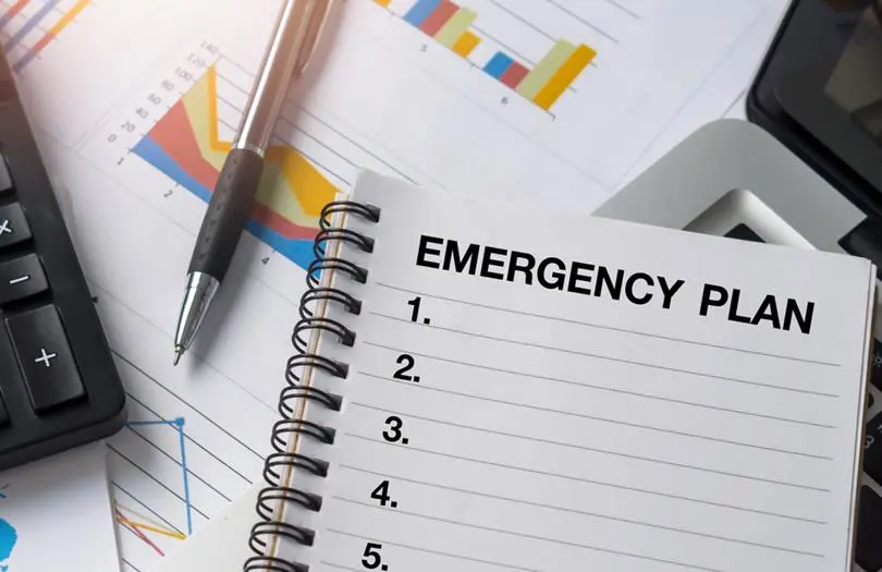 Emergency plan written at top of notepad