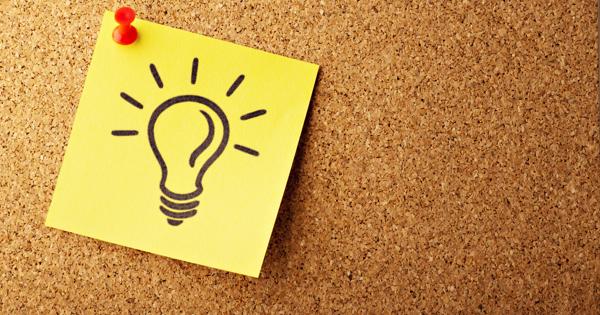 Light bulb on a postnote 