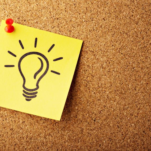 Light bulb on a postnote 