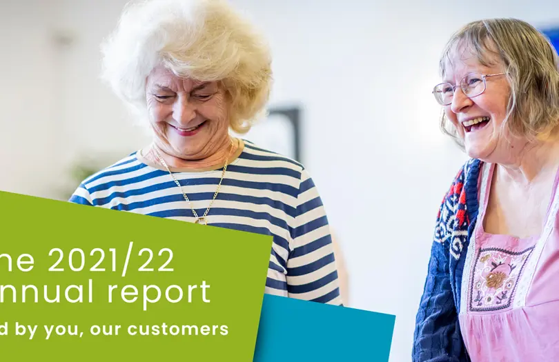two older woman laughing with the text at the front saying annual report 2021-2022