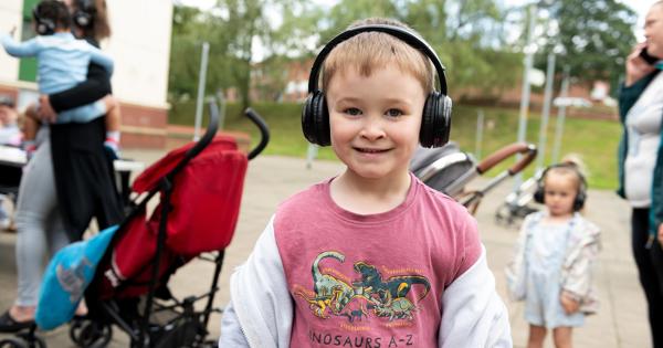 Young Boy At Community Event