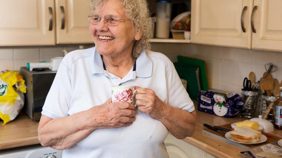 Older woman smiling in home