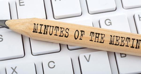 Minutes of meeting words on a pencil