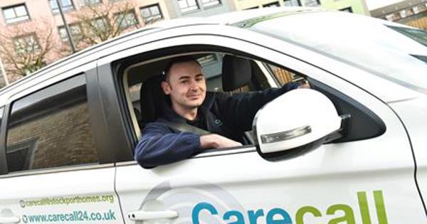 Man in a carecall branded car with the window down and arm outside