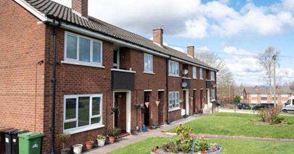 Terrace houses from the front with garden