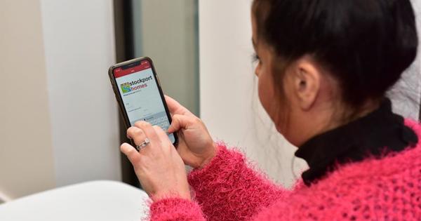 Woman with mobile phone on the ASB page 
