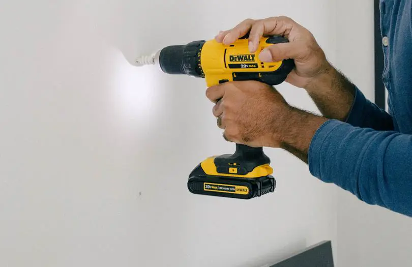 A drill going into a wall