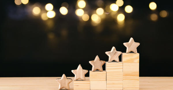wooden stars along a table
