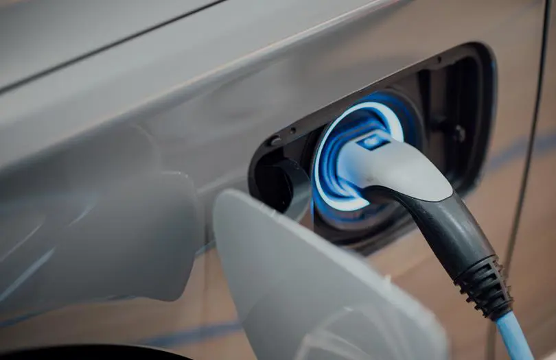 Electric car being charged