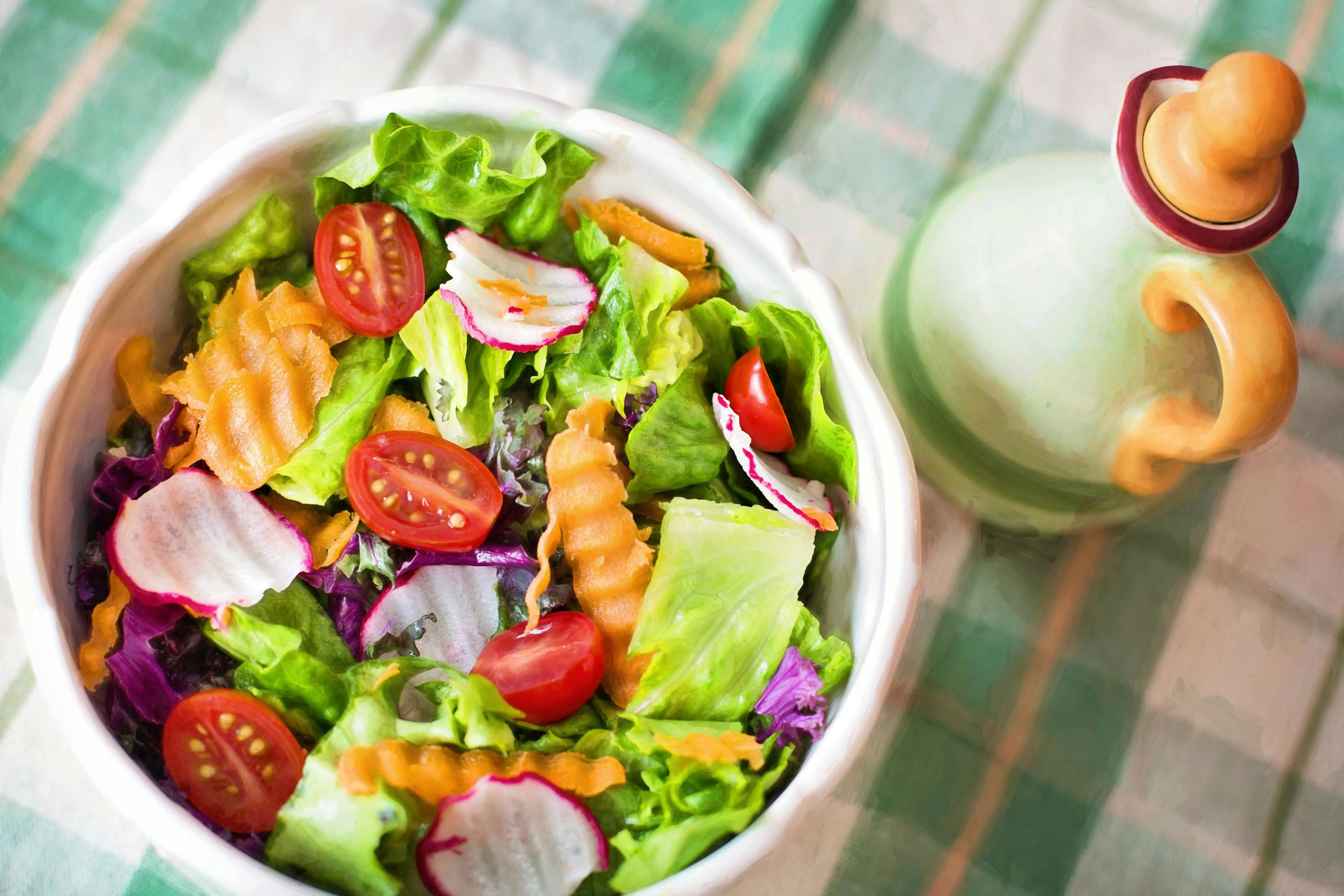 a salad in a bow on a table