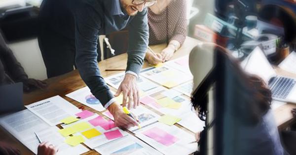 group of people planning with paper 