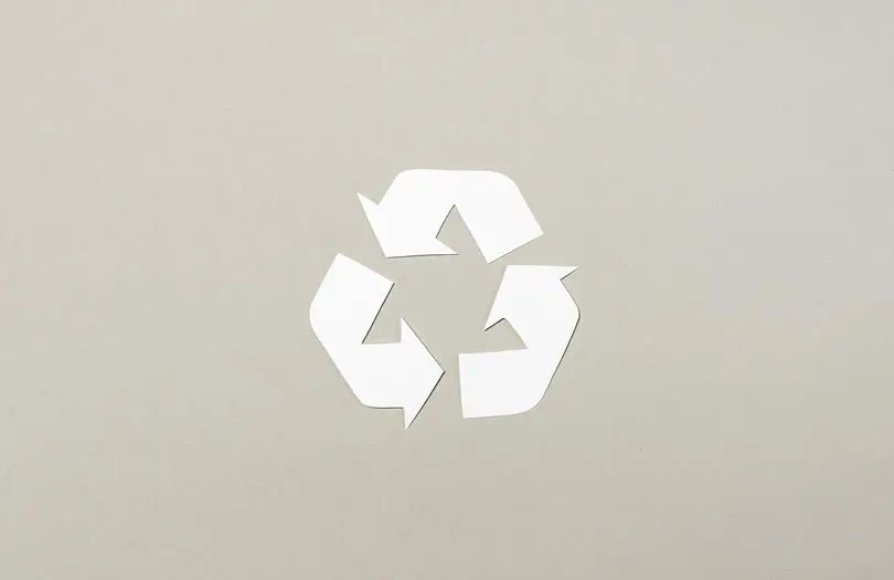recycling logo on grey background 