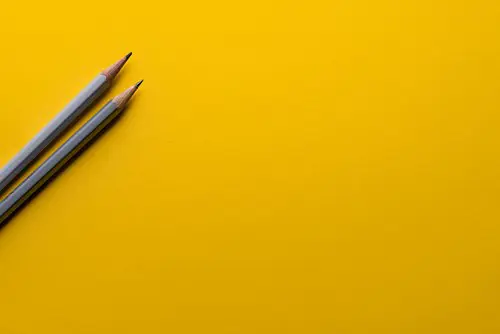 Pencil On A Yellow Background