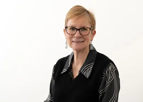 headshot of Marie Gilluley wearing a black shirt